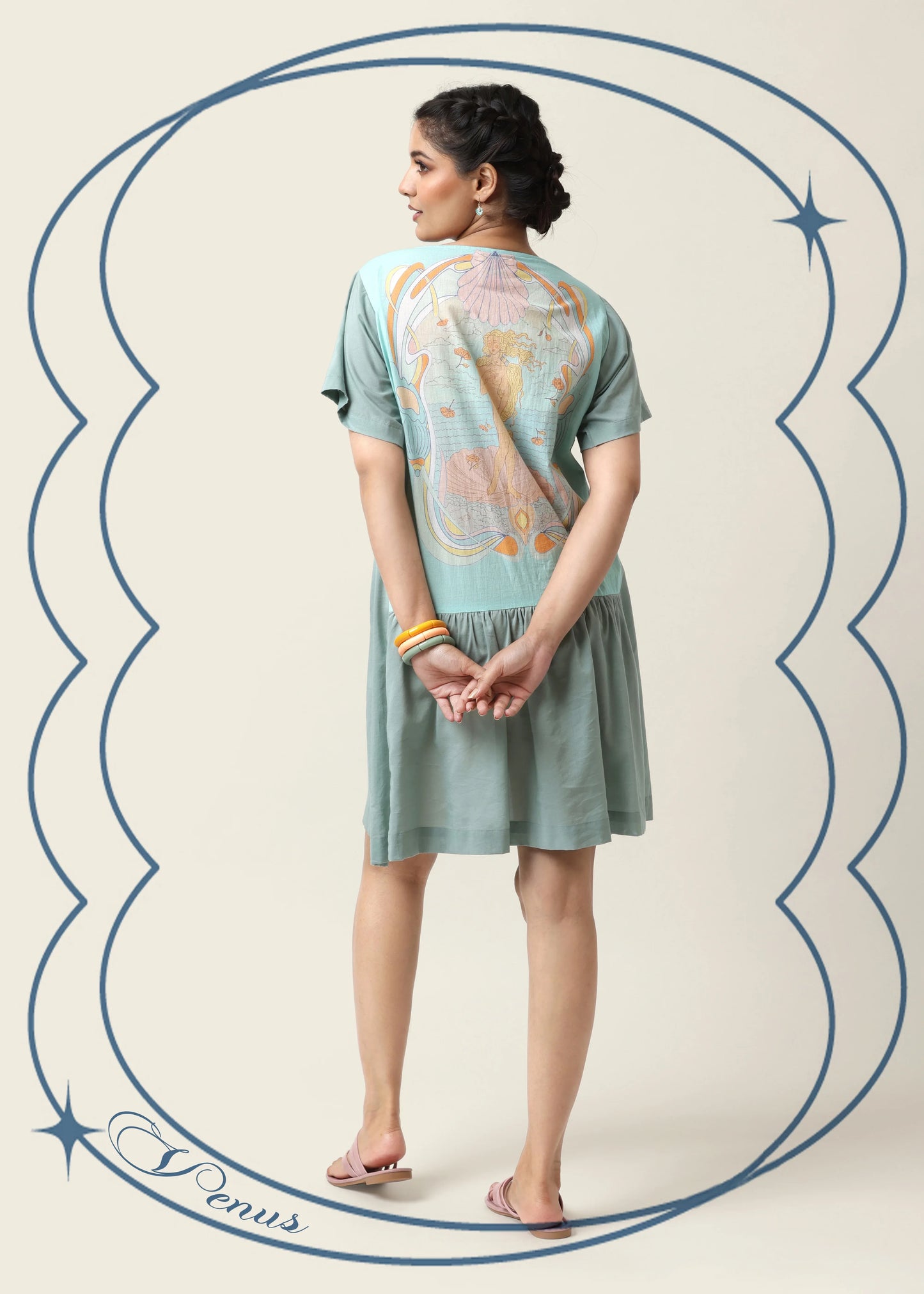 Light blue knee-length robe femme élégante with short sleeves and multicolored mystical motifs, exuding mode féminine. - Robe VENUS - S - ALTER EGO
