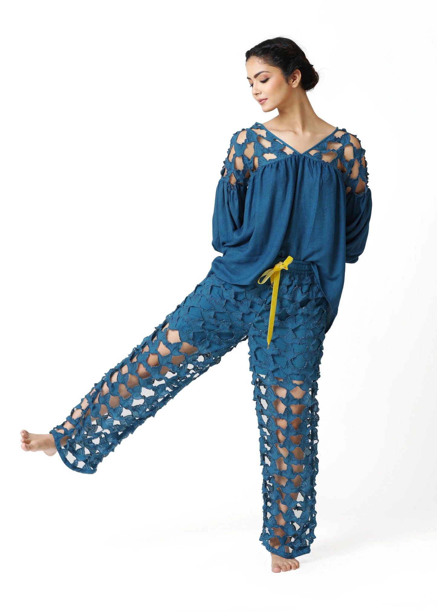 Blue wide-leg pants with intricate cutout embroidery and elastic waistband, styled with matching top, embodying ALTER EGO’s. - Pantalon DOVE - S / Bleu - ALTER EGO