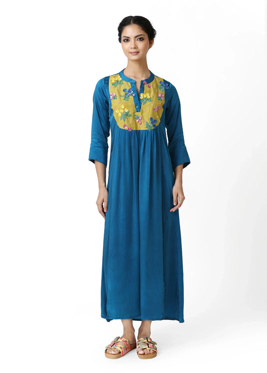 Long blue robe femme élégante with yellow floral embroidery on V-neck plastron, 3/4 sleeves, flowing silhouette, style femme . - Robe Plastron BLOOM - S / Bleu - ALTER EGO