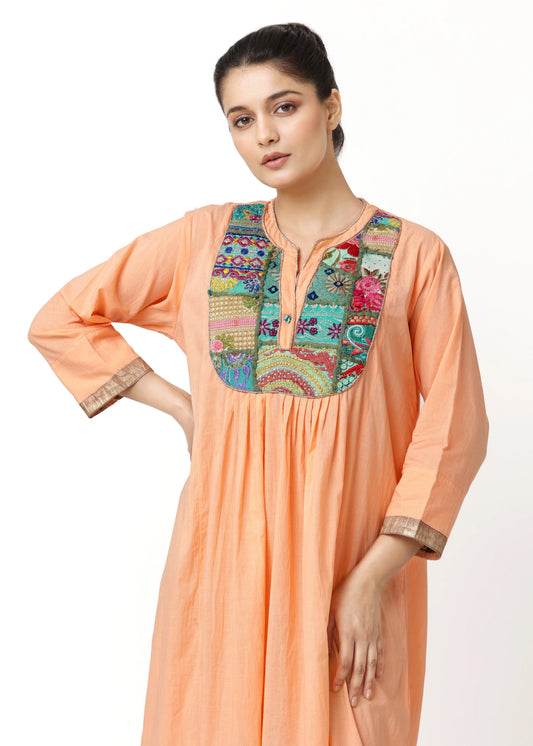 Elegant apricot long-sleeve robe femme élégante with colorful embroidered plastron and subtle metallic trim, embodies mode. - Robe PLASTRON ABRICOT - S - ALTER EGO