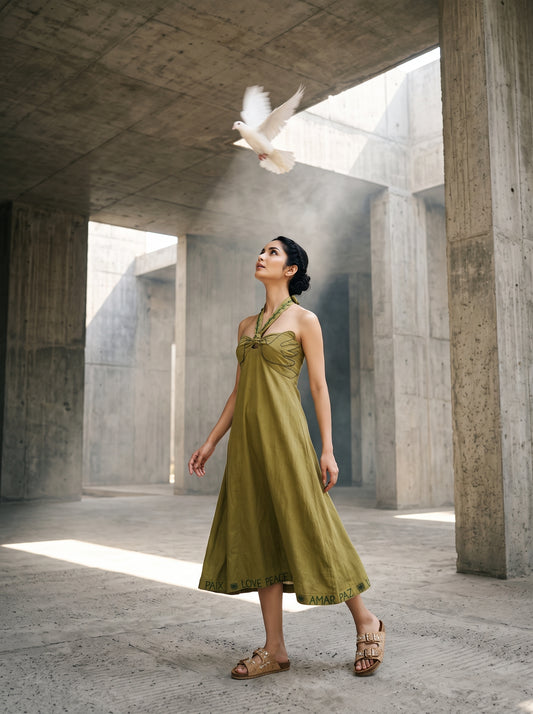 Olive green sleeveless midi dress with a flowing skirt and gathered neckline, styled with flat sandals. - Robe DOVE - XS - ALTER EGO