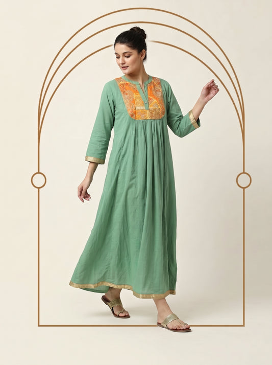 Sage green flowing maxi caftan with three-quarter sleeves, gold embroidered V-neck bodice, and patterned hem. - Robe PLASTRON SAUGE - S - ALTER EGO