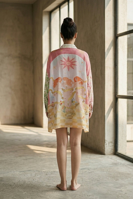 Rear view of a flowing beige silk shirt dress with long sleeves and a colorful coral, pink, and yellow floral print. - Chemise GRACES - XS - ALTER EGO